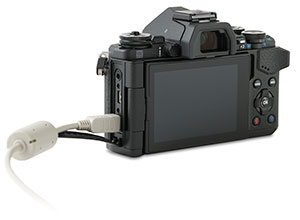 Olympus E-M5 II camera USB port with cable and door open